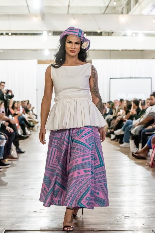 Model walking the 2022 Le Pasefika Runway