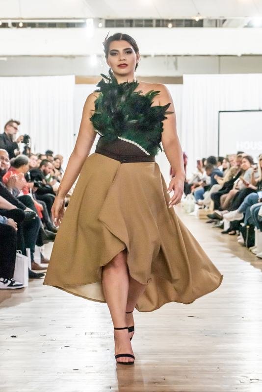 Model walking the 2022 Le Pasefika Runway