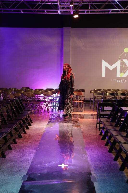 Model on the Le Pasefika Runway 2025 stage