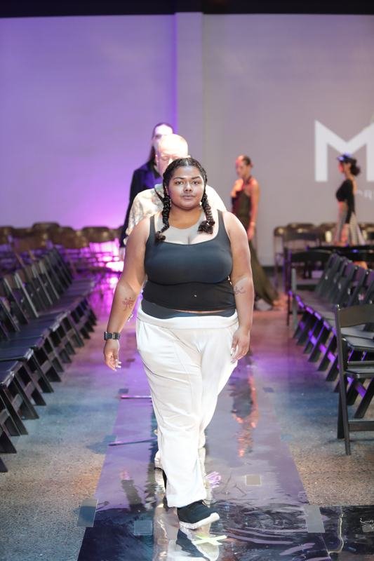 Model in a designer collection at the 2025 Le Pasefika Runway show