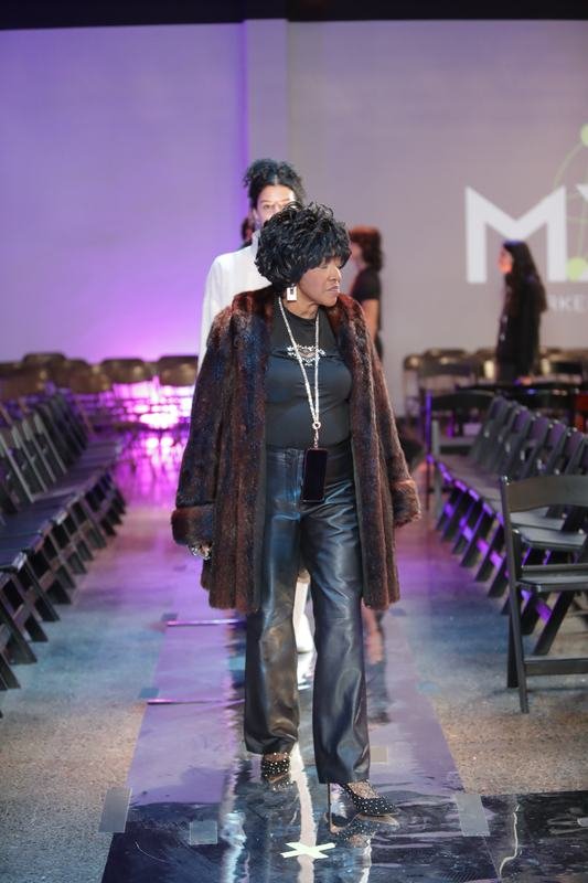 Model in a designer collection at the 2025 Le Pasefika Runway show